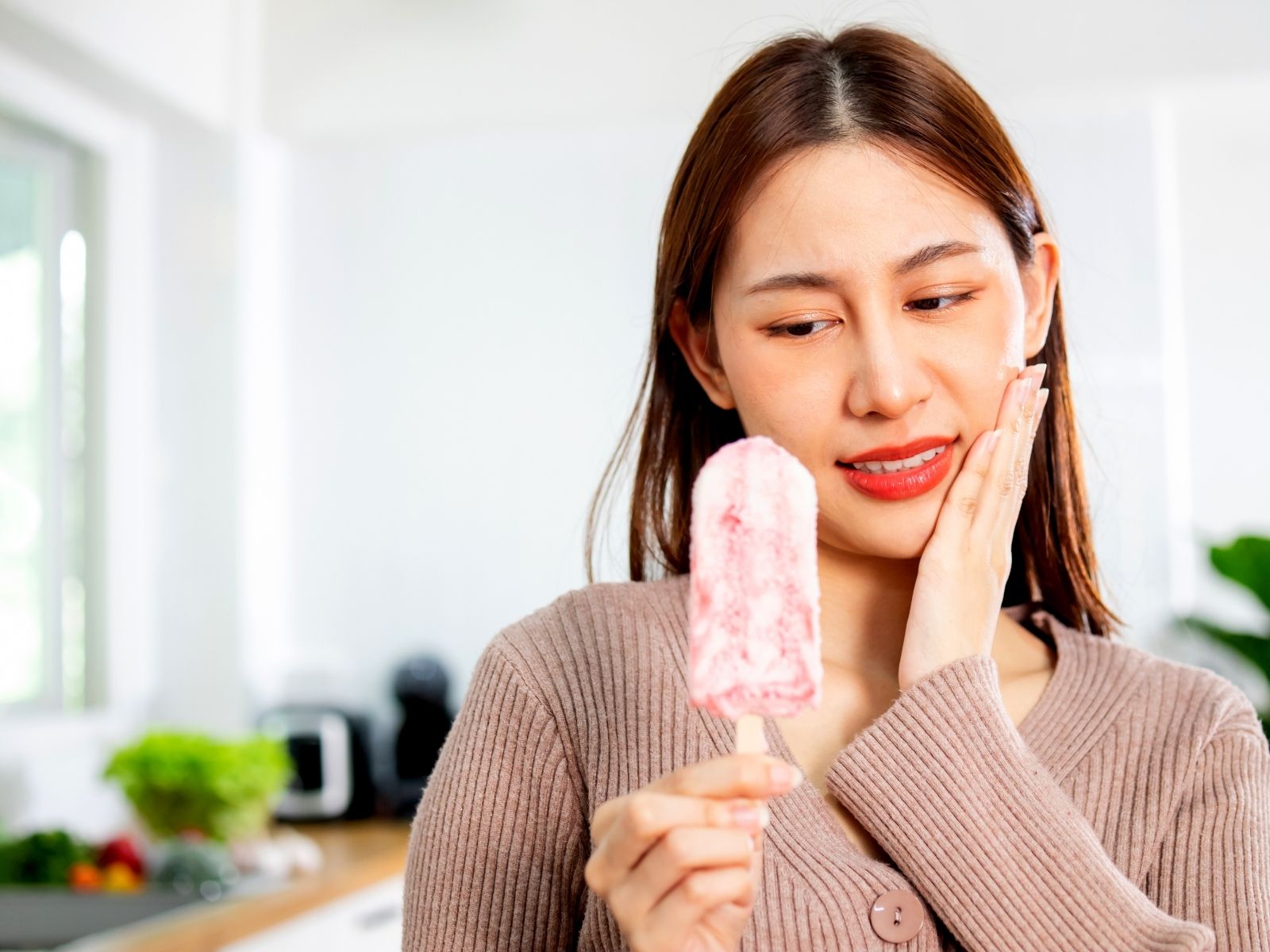 9 Real Causes of Tooth Sensitivity and How to Get Relief